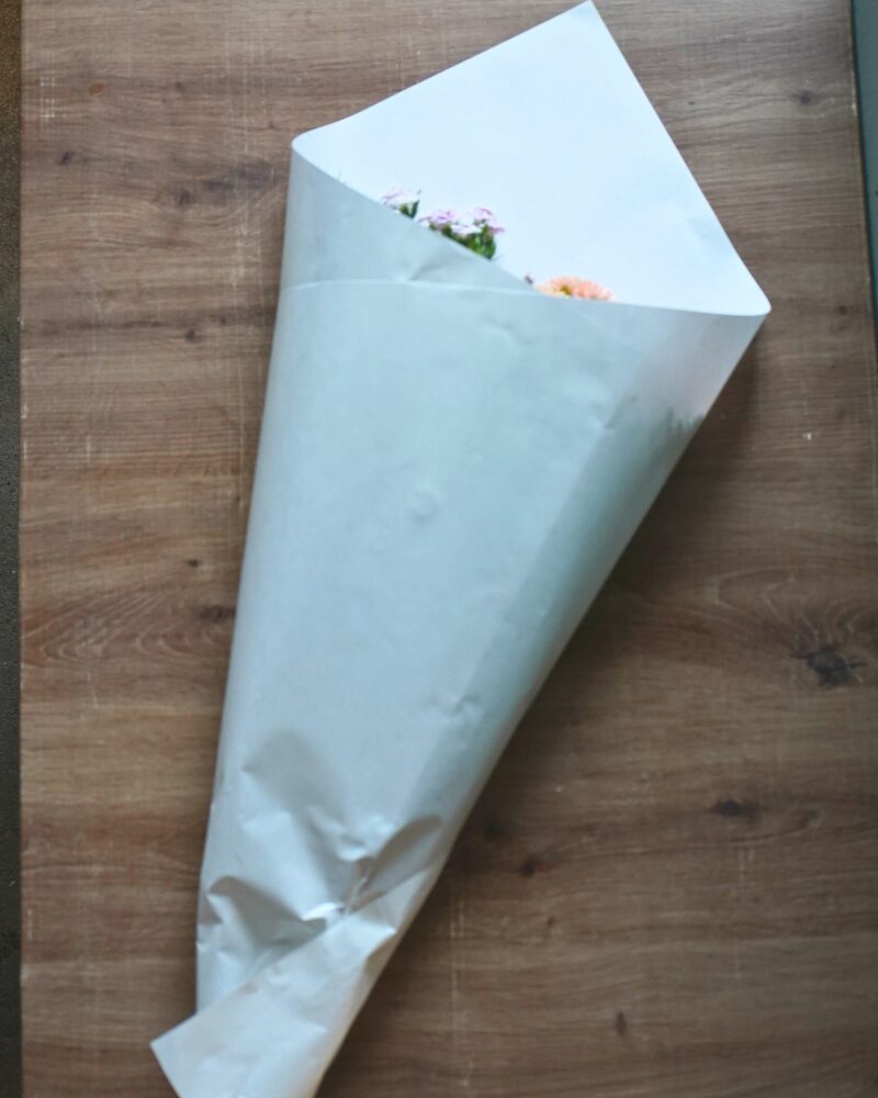 紙にく